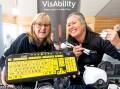 VisAbility therapy assistant Jenny Adams and orientation and mobility specialist Jodi Prentice at the Sharing the Care Expo 2024. Picture by Phillip Biggs