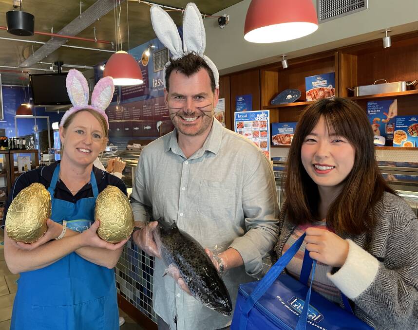 Salmon Tasmania chief executive Luke Martin, with Tassal retail manager Kate Dawe (L) and salmon shopper Cynthia Liu. Picture by Ben Seeder 