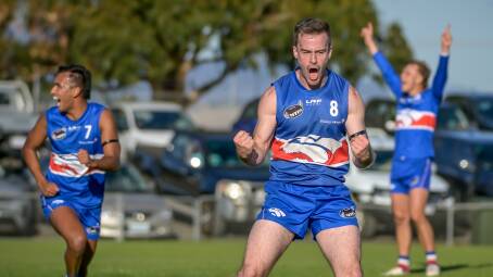 South Launceston's Jordan Bennett celebrates his goal just as the half-time siren blows. Pictures by Craig George
