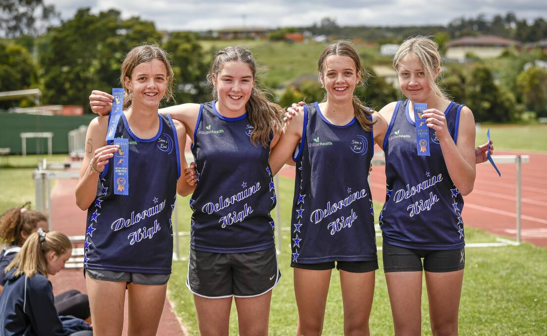 Isabella Sherriff (left) and teammates from Deloraine High School celebrate their 100 metre grade 7 relay win at the inter-high athletic carnival in 2021. Picture by Craig George