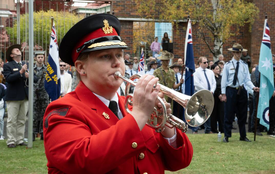 City of Launceston RSL Band bugler Evelyn Beasley at the 11am Anzac Day service, Launceston Cenotaph. Picture by Paul Scambler