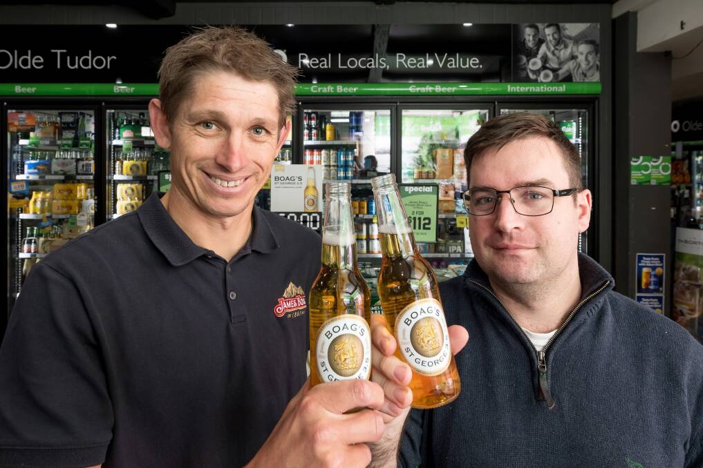 Boags key account manager Scott Hill and Olde Tudor bottle shop manager Nick Pedley. Picture by Philip Biggs.
