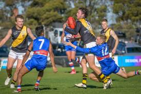 Longford and South Launceston battle it out at Youngtown Oval on Saturday. Picture by Craig George 