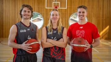 University of Tasmania basketballers Alex Bestwick, Josie Pinkerton and Ruben Carlsson, all 23, at the Newnham campus on Tuesday. Pictures by Paul Scambler 