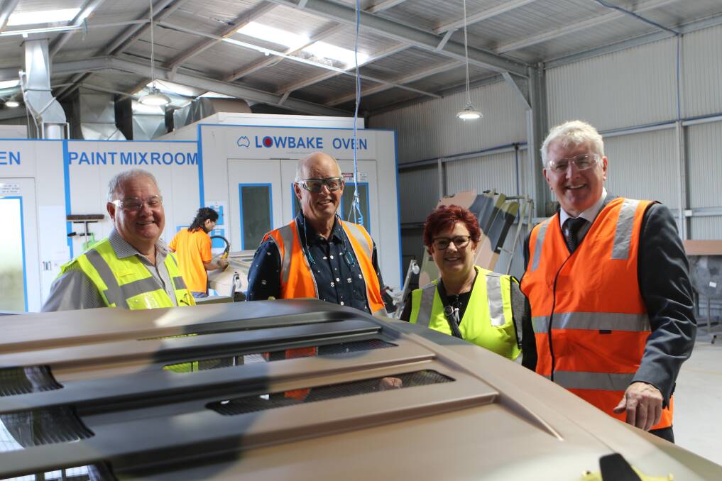 FORGING AHEAD: Adrian Polden and John van de Woude of Penguin Composites, with MPs Anne Urqhart and Brendan O'Connor. Picture: Meg Whitfield