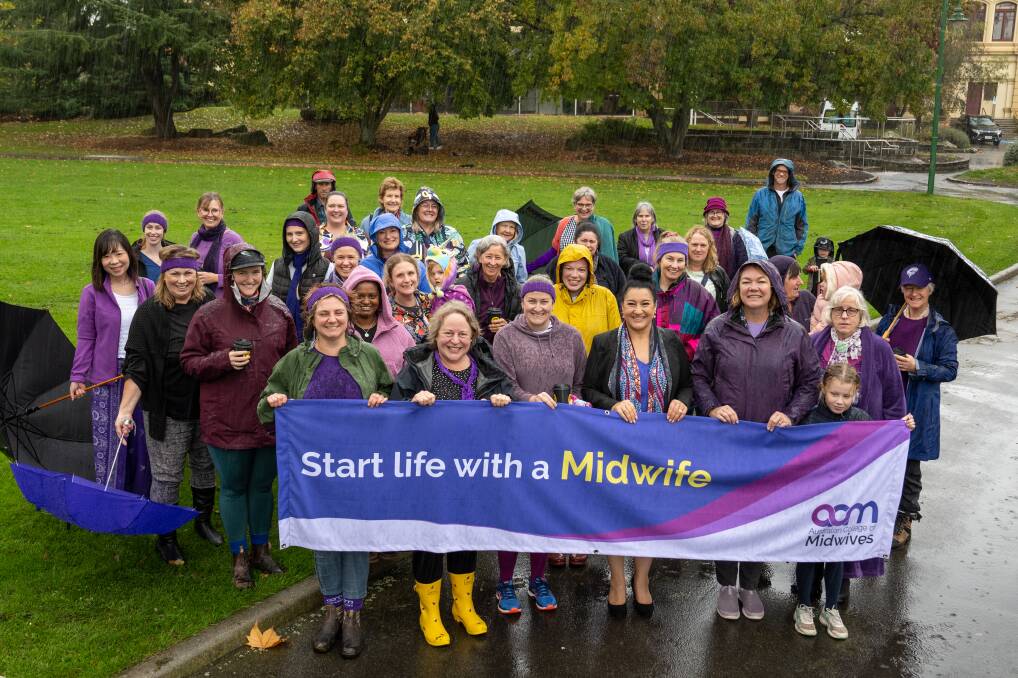 Rain, hail or shine, midwives and supporters came together to walk for Day of the Midwife on Friday. Picture by Paul Scambler