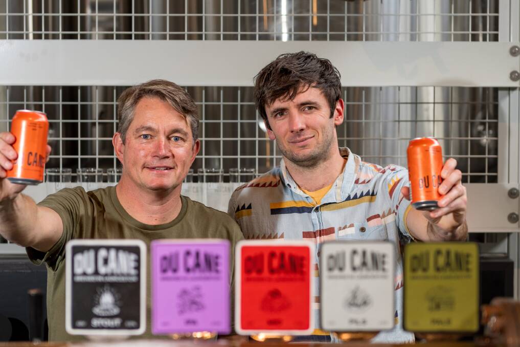 Du Cane Brewery co-founders Sam Reid and Will Horan cheers to being finalists in travel awards. Picture by Phillip Biggs