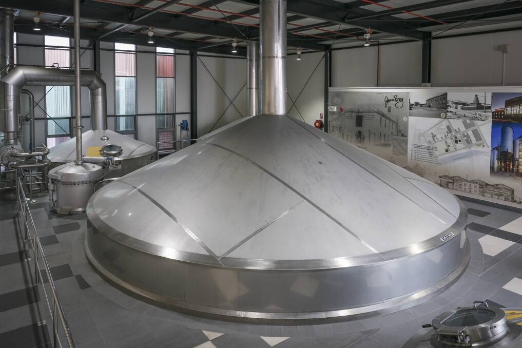 The huge stainless steel vats inside the brew house