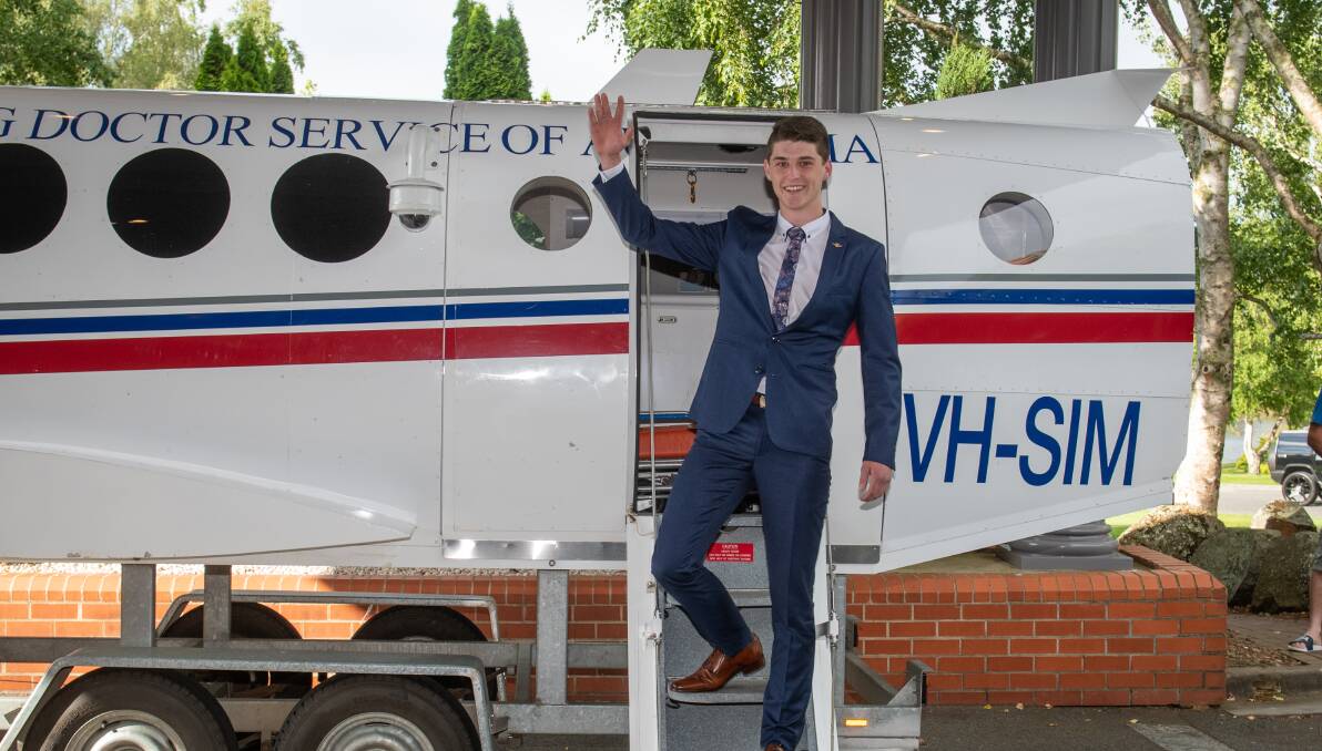 OFF TO A FLYING START: Prospect High graduate Riley Kerr arriving at the Country Club for his leavers dinner. Picture: Paul Scambler