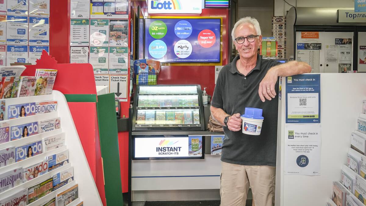 KIND HEARTS: Garry Matthews from Brisbane Street News and Lotto participating in the Examiner Empty Stocking Appeal. Picture: Craig George 