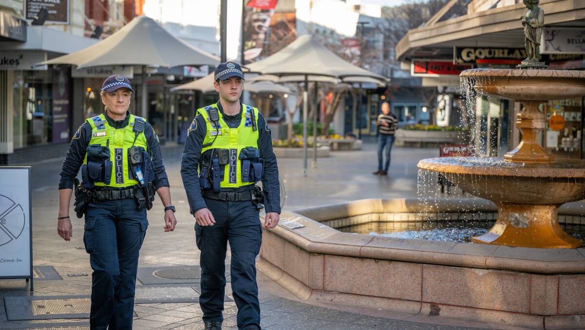 Constables Mark Drinkwater and Lindy Cornish, in Launceston's CBD. Picture by Paul Scambler