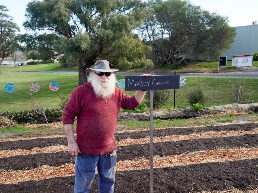 Peter Richards of various gardens, including the Ravenswood community garden, at the FaRM community garden at the Northern Suburbs Community Centre. Picture by Rod Thompson