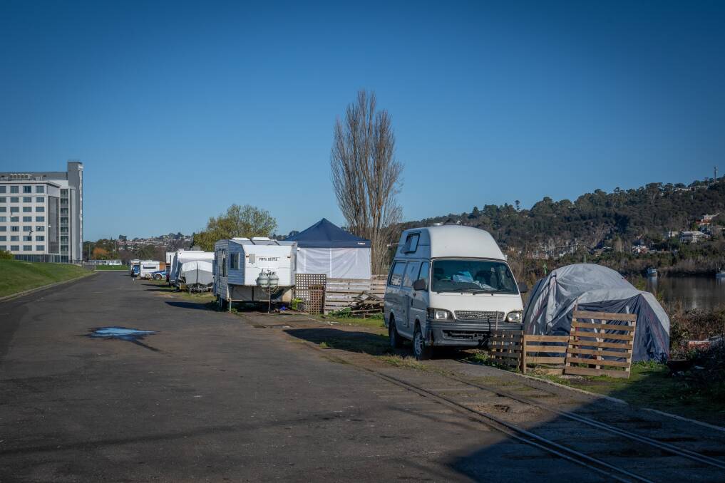 A photo of the homeless camp on crown land at Kings Wharf, just metres away from the Peppers Silo hotel. Picture by Paul Scambler
