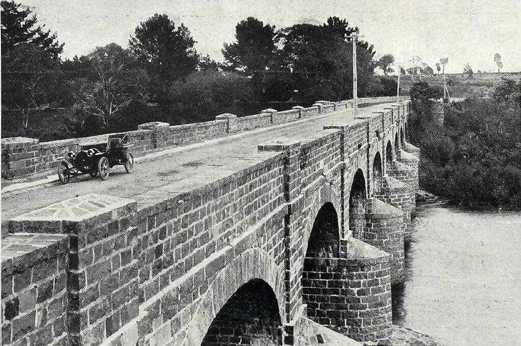 The convict-built 1839 bluestone bridge at Perth, pictured before the great flood of 1929. Picture by Weekly Courier, April 17, 1929