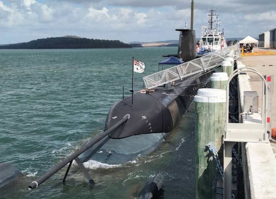 A sub, identified as HMAS Dechaineux, docked at Tasports' Beauty Point wharf earlier on Wednesday. Picture by Jesse Chippindall