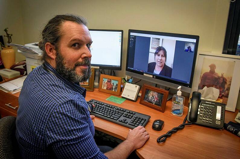 Royal Australian College of General Practitioners Tasmanian chair Dr Toby Gardner at his desk. File picture