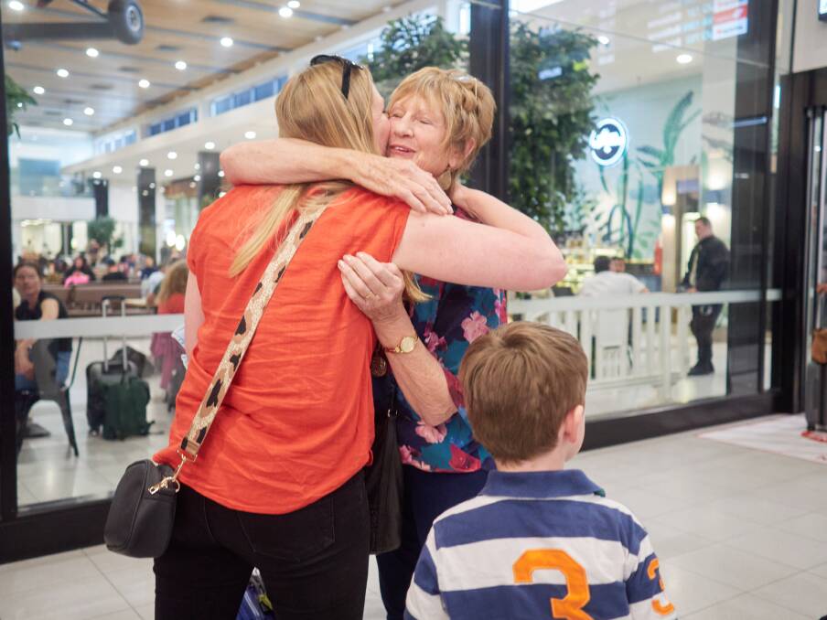 Daughter Michelle Duffy greets Janine Targett at the Launceston Airport. Picture by Rod Thompson