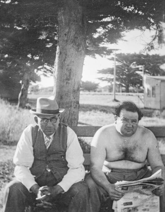 Harry Lewis (right) pictured in August 1952. Picture supplied