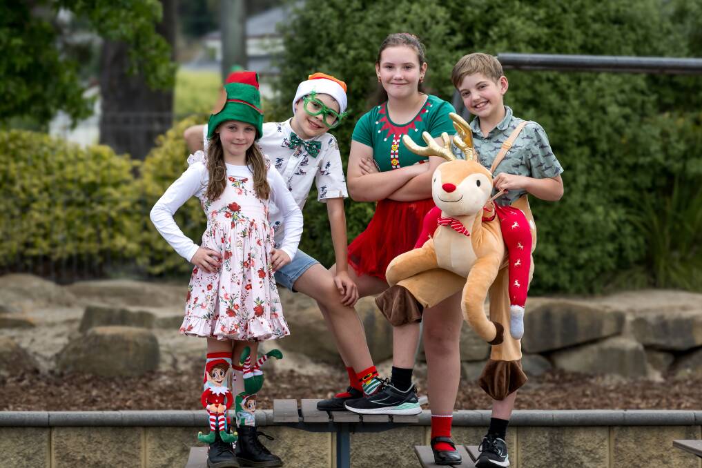 Glen Dhu Primary School pupils raised more than $2250 for a family of a school pupil who lost most of their possessions in a house fire. Pictured are Grade 1 pupil Ruby Shadbolt, Grade 3 pupil Oliver Slater, Grade 5 pupil Kelsy Berne, Grade 4 pupil Liam Whyte. Picture by Phillip Biggs