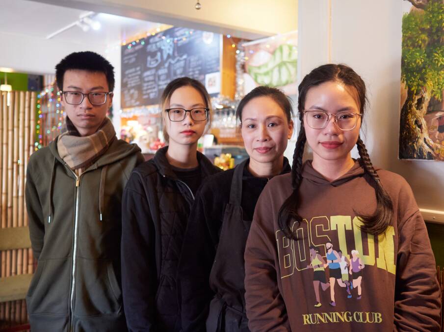 Mekong Vietnamese Restaurant owner Dan Thi Tran and her three children, Dat Vo, Linh Vo, and Lam Vo. Picture by Rod Thompson