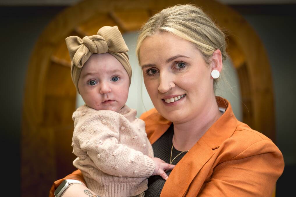 Launceston mother Maddy McKenna is sharing her story to raise awareness for Childhood Cancer Awareness Month. She is pictured with her daughter Hazel Stiboy. Picture by Phillip Biggs