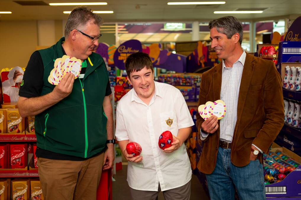 Woolworths Riverside manager Wesley Polden, year 12 student Joe Murray, and St.Giles allied health director Trent McHugh, ahead of the 2023 Woolworths Easter Appeal. Picture supplied