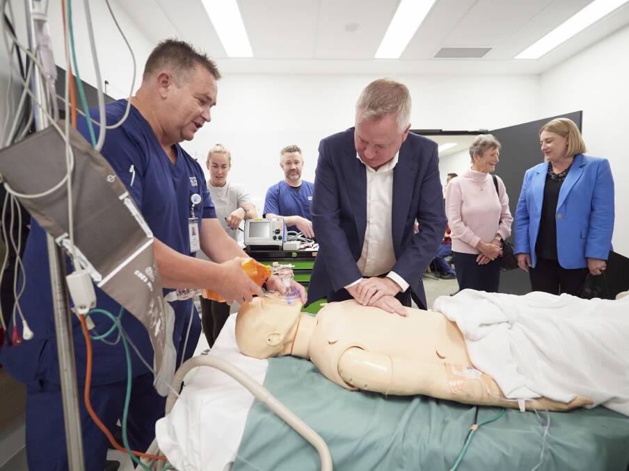 Premier Jeremy Rockliff applies life giving attention to "Nigel" with direction from Life Support Coordinator Craig Shennan with Anne O'Byrne and Director of Health Kathrine Morgan-Wicks at the LGH First Stage opening. Picture by Rod Thompson 