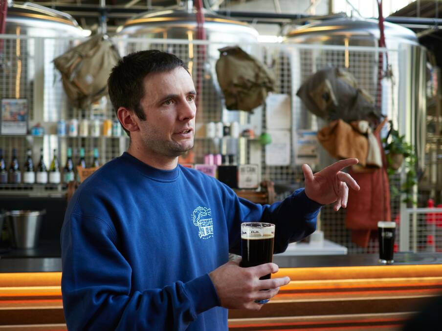 Will Horan talks about the brewing process for the black coffee IPA. Picture Rod Thompson