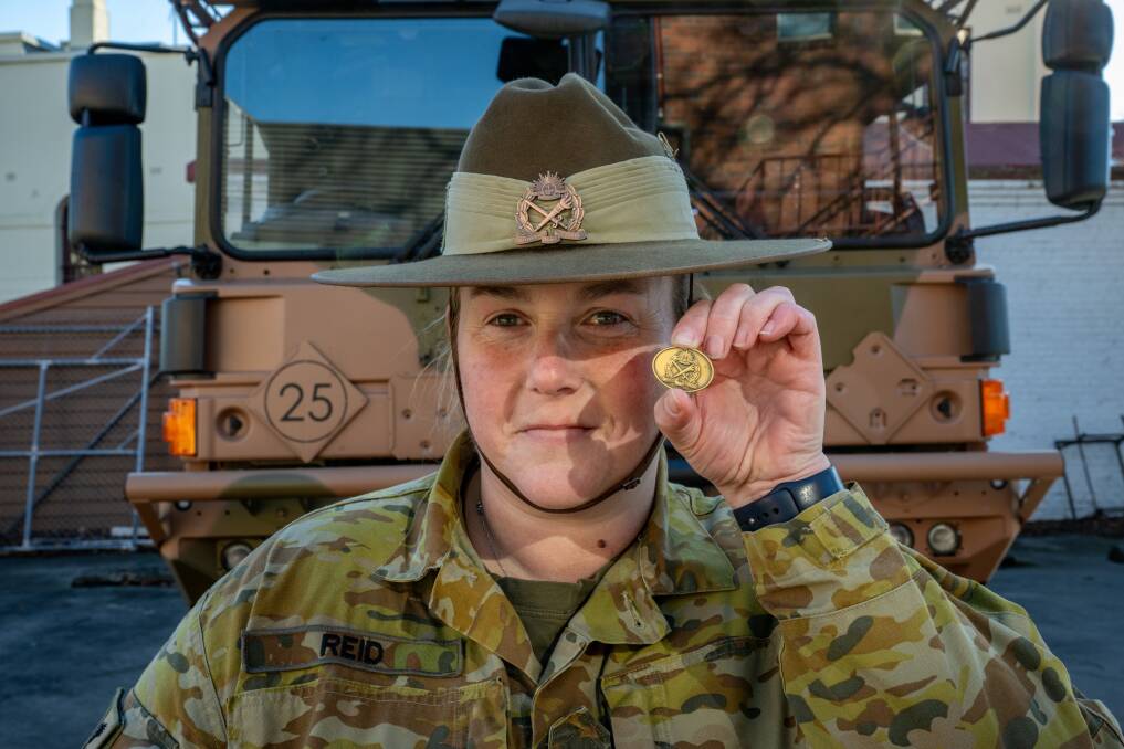 Australian Army Cadet Captain Jennifer Reid, a volunteer from 603 Army Cadet Unit Scottsdale, stands at the Patterson Barracks with her Gold commendation pin. Picture by Paul Scambler
