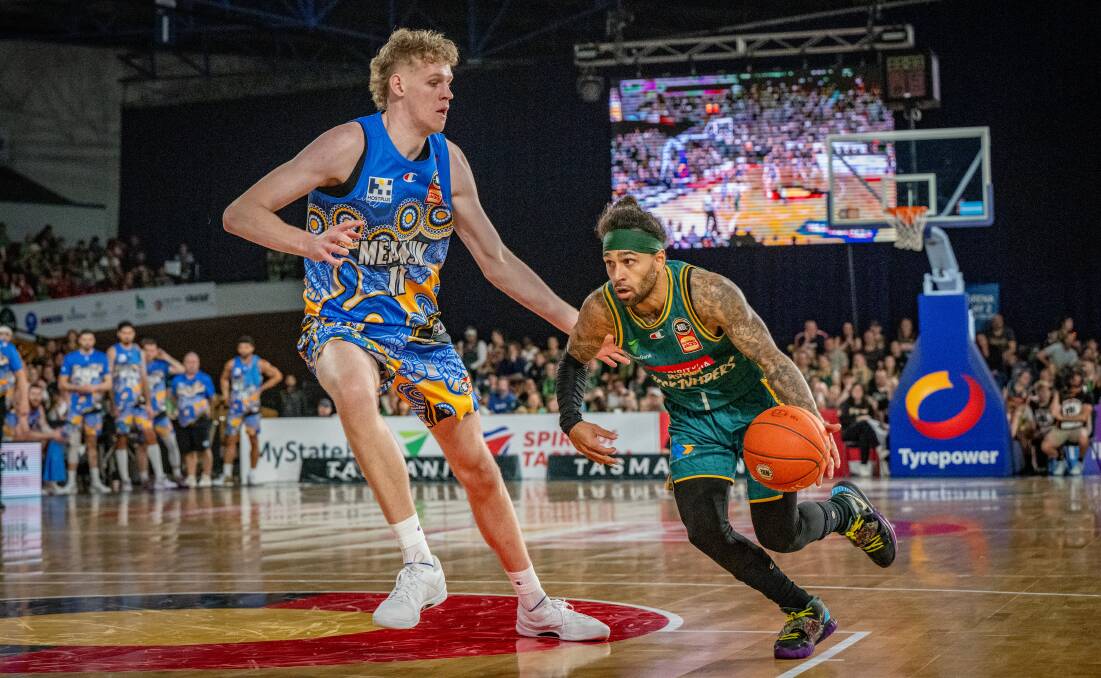 Jordon Crawford attempts to dribble around Rocco Zikarsky in the JackJumpers' Silverdome win against the Brisbane Bullets. Pictures by Paul Scambler