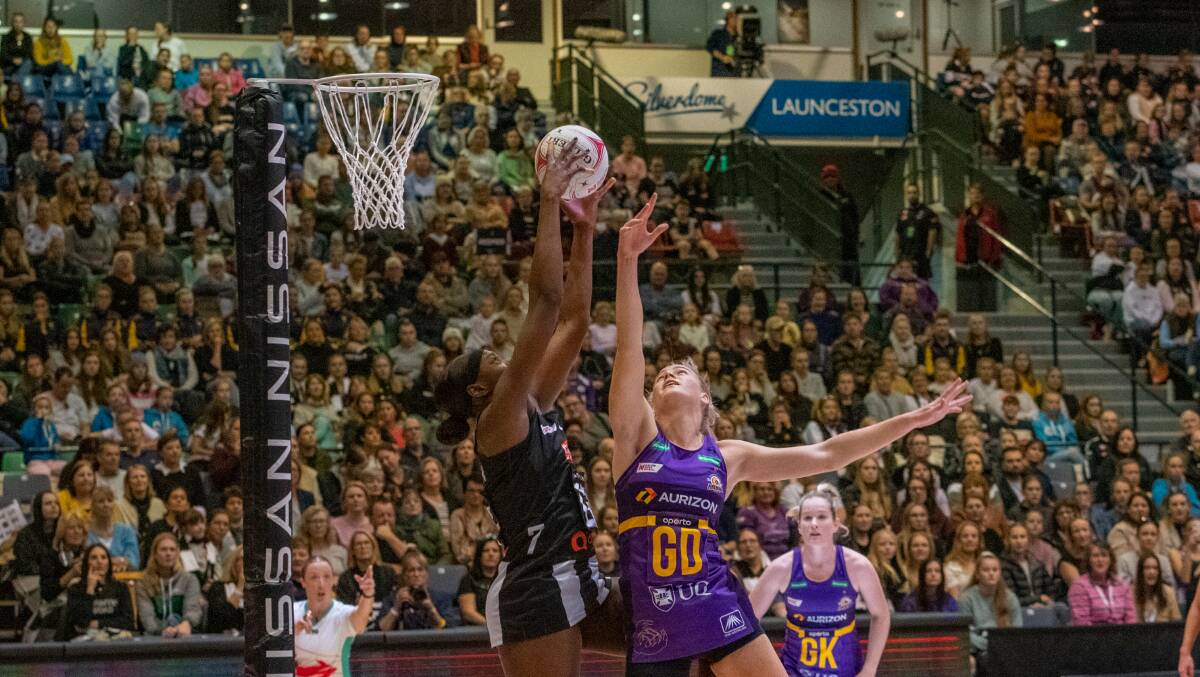 Collingwood face Queensland in front of a packed crowd at the Silverdome during a 2021 Super Netball clash. Picture by Paul Scambler
