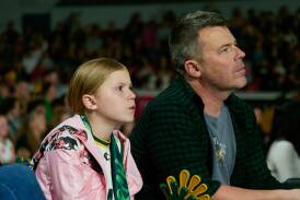 Tasmania JackJumpers fan Evie Hanson,10, watches on at the Silverdome. Picture by Rod Thompson