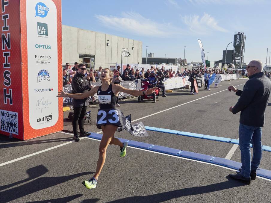 Leanne Pompeani celebrates as she crosses the finish line in the Launceston 10. Pictures by Rod Thompson