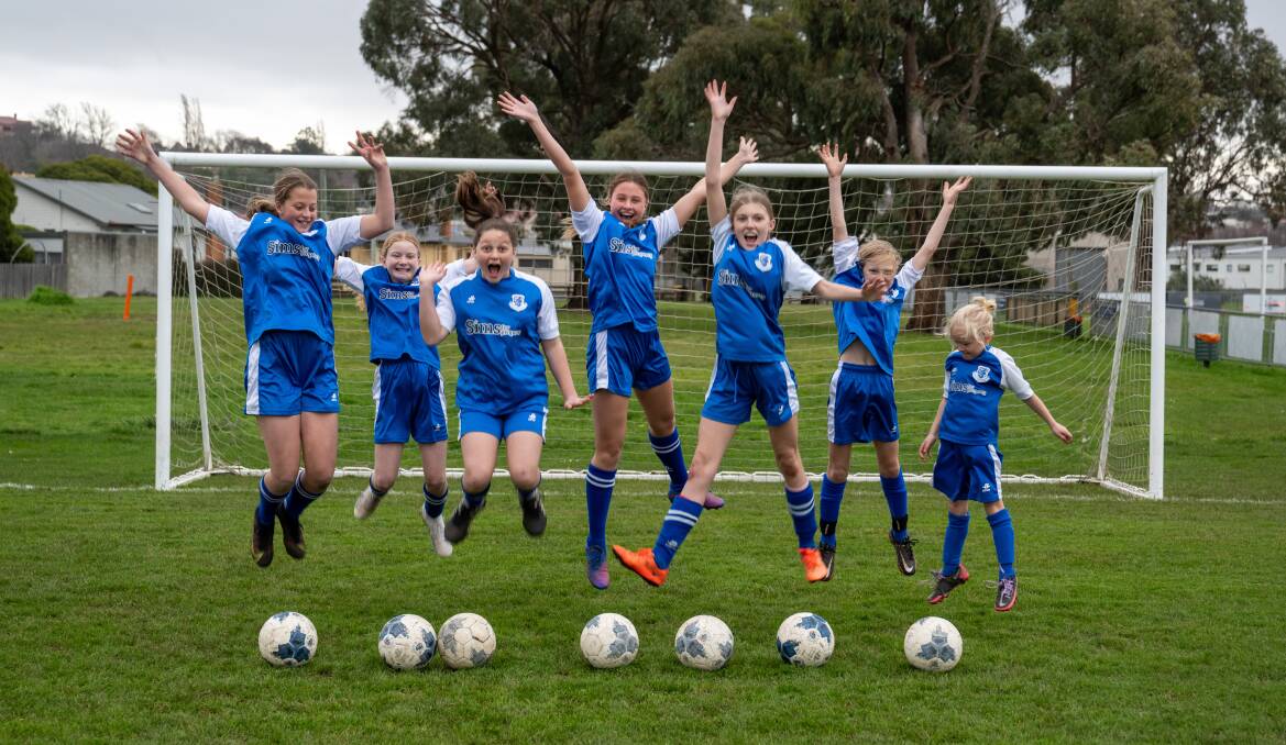Launceston United players Chloe Grainger, 13, Olivia Davie, 12, Lexi Albiers, 13, Zoe Jarvis, 13, Milla Johnston, 13, Tilly Shaw, 10 and Eleanor Shaw, 6, excited about the upcoming World Cup. Picture by Paul Scambler 