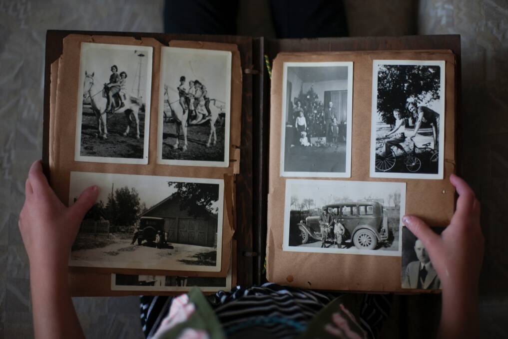 A collection of old photographs. Picture by Laura Fuhrman from Unsplash. 
