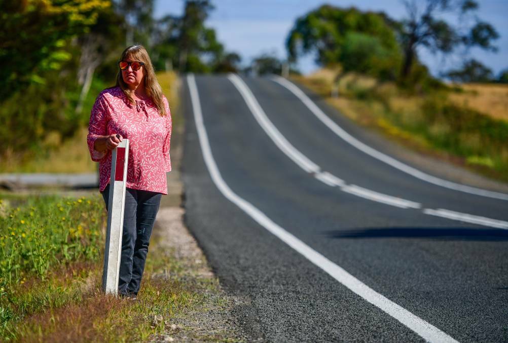 Cheryl Swan walks beside the highway where her son was killed on Mother's Day in 2018. Pictures by Scott Gelston. 
