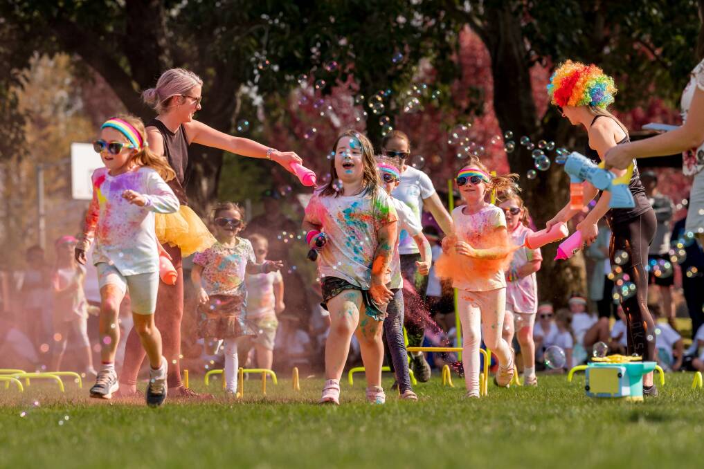 Perth Primary School's oval was a wash of colour for their inaugural colour run which hopes to raise funds for the school playground. Picture by Phillip Biggs. 