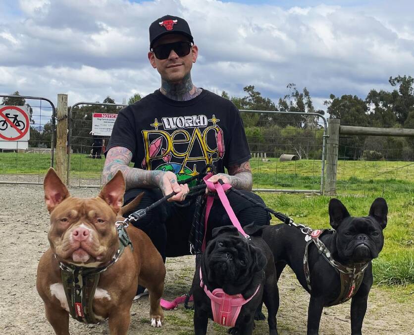 Matthew Garwood with his fur babies. Picture from Instagram. 
