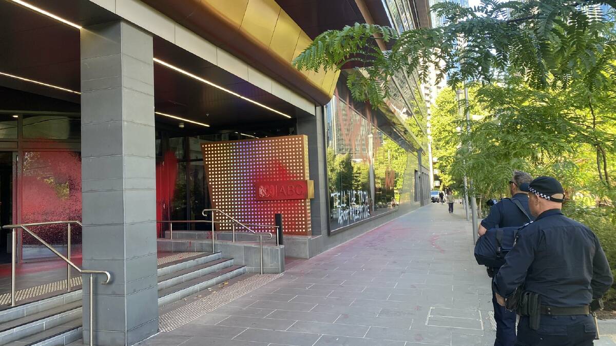 Police at the office in Southbank, Melbourne on December 22. Picture via X/@lukesdundon