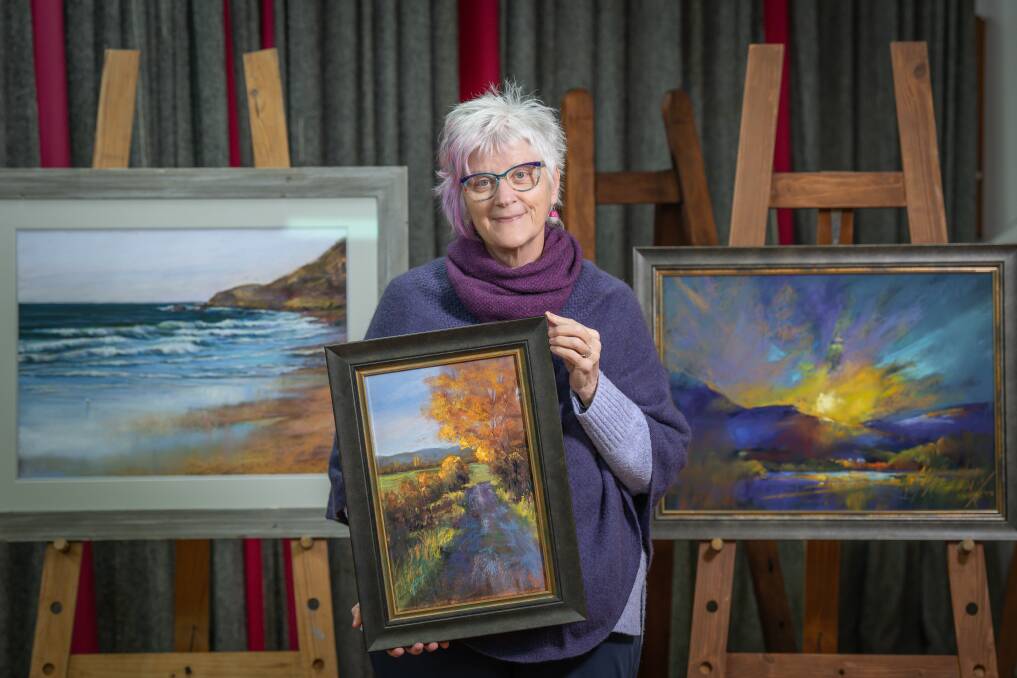 Artist June Wilson with some of her works from in the 'Our City' exhibition for the Launceston Art Society at Legacy House. Picture by Craig George