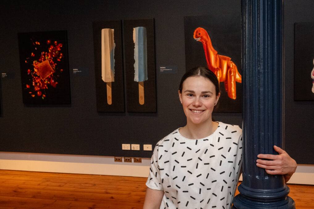 Tasmanian artist Katie Barron at Queen Victoria Art Gallery at Royal Park with her work. Picture by Paul Scambler 