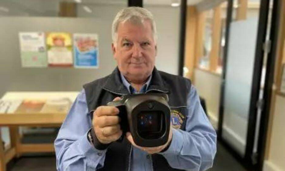 Lions Eye Health program facilitator Rob Mantach with a new camera to help test students' eyesight, pictured in 2023 . Picture by Duncan Bailey 