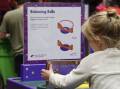 A balancing balls activity at the Questacon exhibitions at QVMAG. Picture supplied