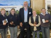 Grade nine students from Launceston Grammar Church School, Charlotte Green, Isabel Archer, Gracie Hirst and Penny Green with director of the Tasmanian Institute of Agriculture, Professor Mike Rose. Let it Grow competition at Agfest 2024. Picture by Saree Salter