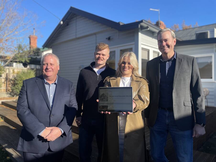 Left to Right: Liberal MP, Rob Fairs, first-home buyers, Patrick Illingworth and Grace Burden, and Treasurer and Acting Minister for Finance, Michael Ferguson in Launceston. Picture by Hugh Bohane.