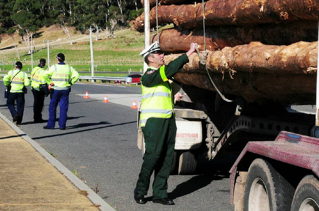 Heavy vehicle roadworthiness spot checks at Howth near Burnie.
North West Regional Manager Transport Compliance Harry Marshall checks a log truck. Picture by Neil Richardson