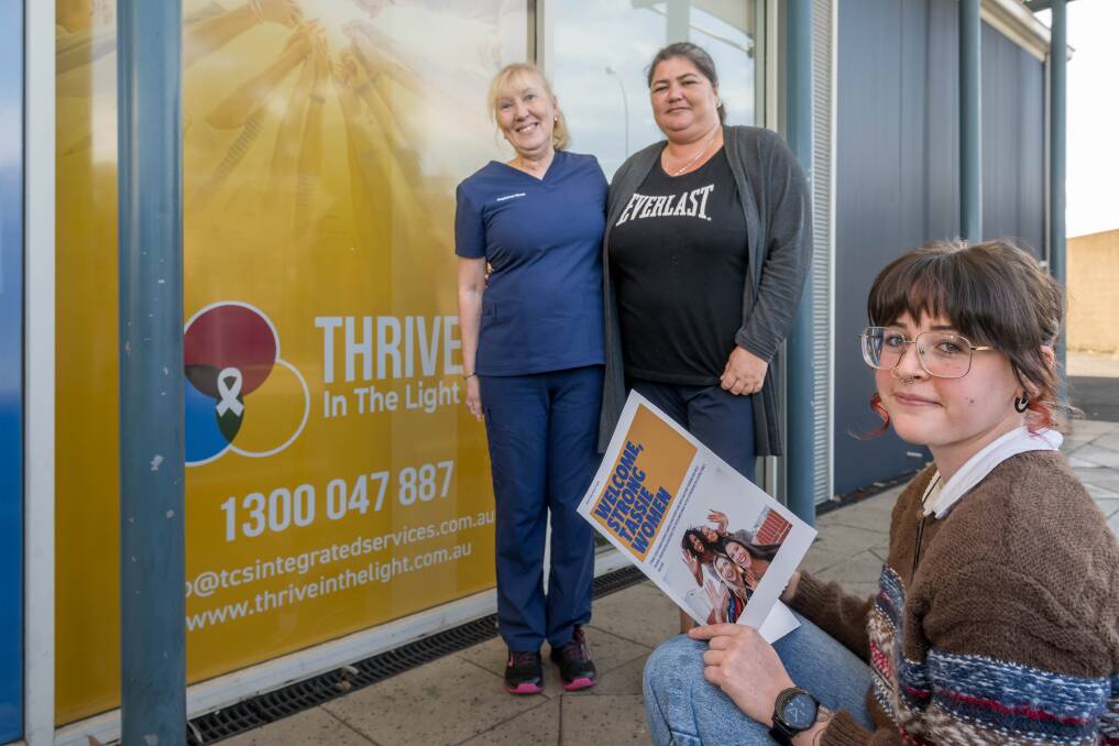 Some of the 'Thrive in the Light' team at the Launceston office. Picture by Phillip Biggs.