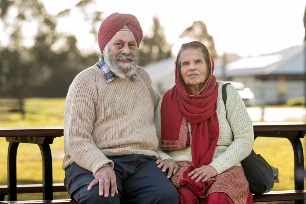 Kulwant and Mahinder Dhillon of Grindelwald were the first Sikh migrants to Tasmania 54 years ago, pictured at the Perth train park during Peter Gutwein's walk from Burnie to Hobart. Picture by Phillip Biggs