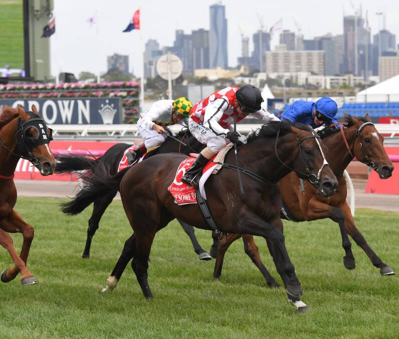 NEW TRADITIONS: Stephen Baster riding Awesome Rock defeats Seaburge and Hauraki in the Emirates Stakes which was, for 78 years, known as the LKS MacKinnon Stakes.  Picture: Getty Images
