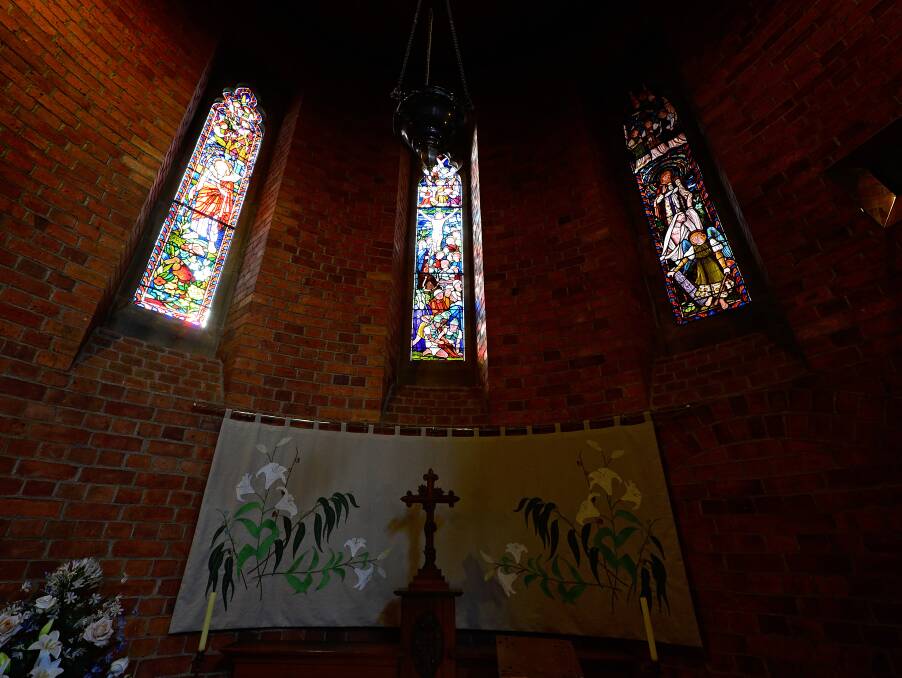 DETAIL: The Lady Chapel, with stained glass windows from the original church that was on the site of Holy Trinity Anglican Church.